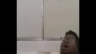 Masturbating
